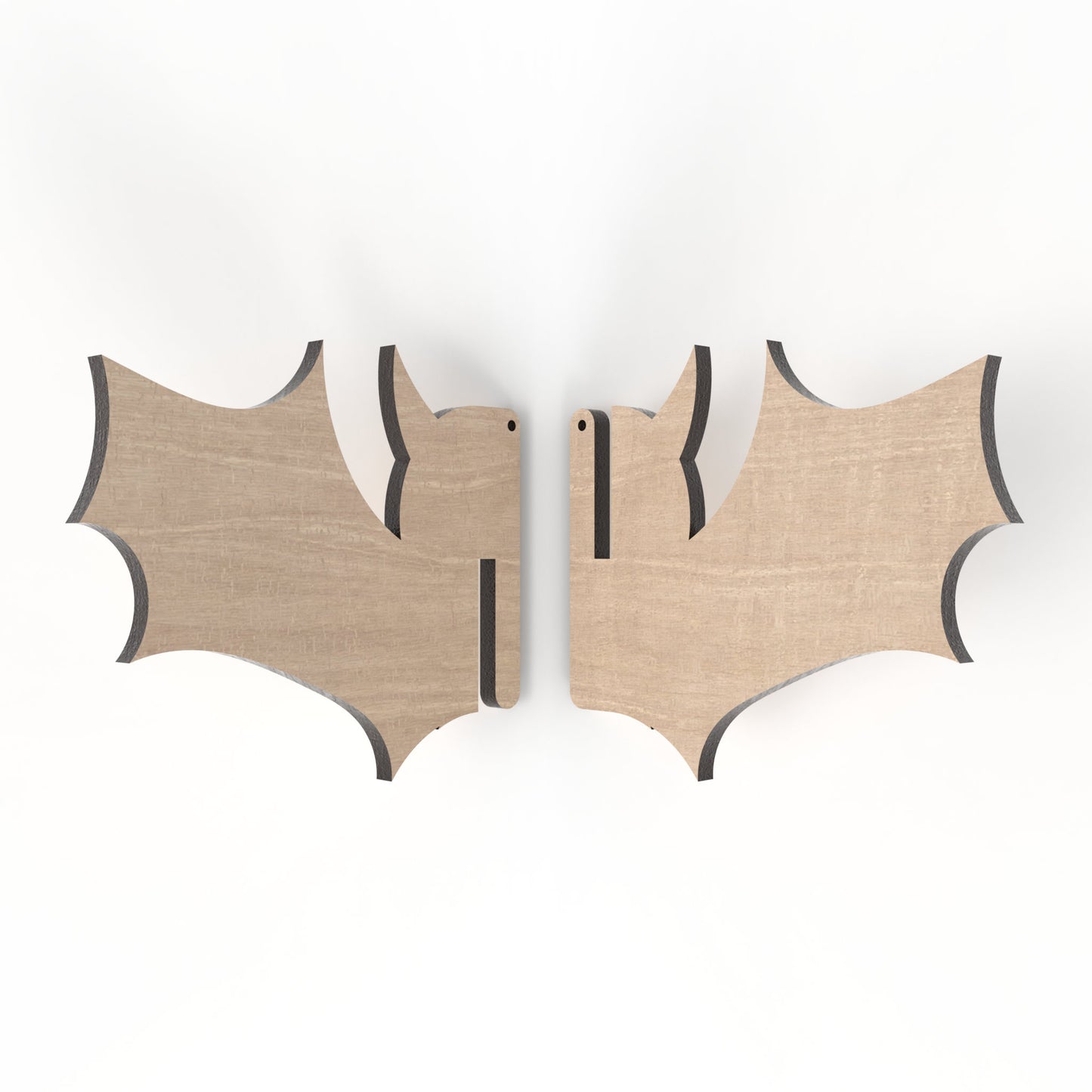 An exploded view of our slot together 3D Halloween bat made from our laser cutting files and available for digital download.