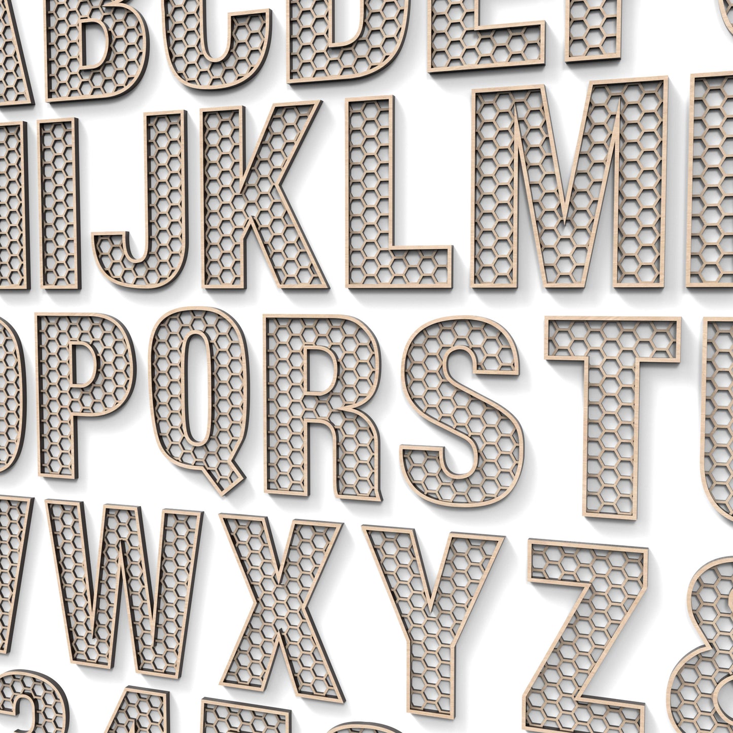 The Full Alphabet A - Z and numbers 0 - 9 of Honeycomb Letters and Numbers made from our laser cutting files and available for digital download. Each letter or number has a honeycomb pattern cut out of its centre and can have a second edge trim layer to give depth.