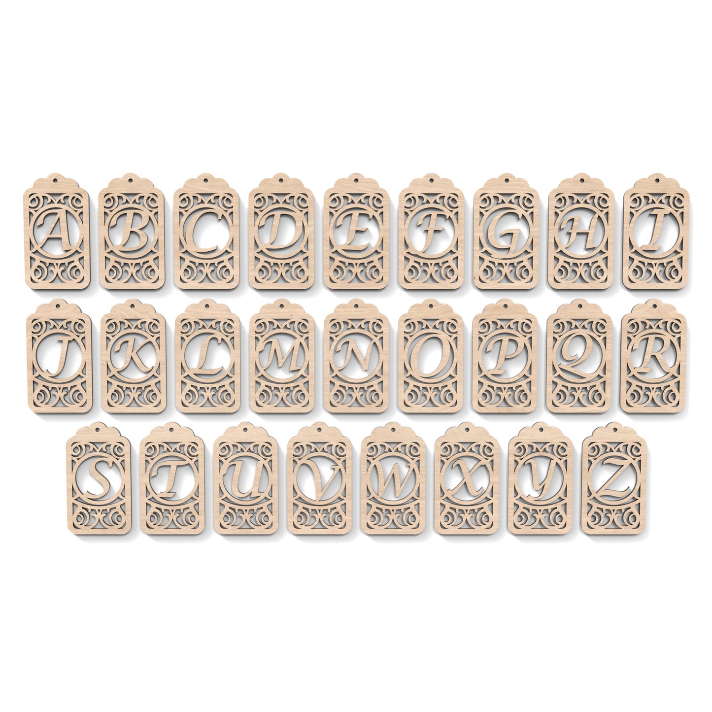 The full alphabet A-Z of Monogram Gift Tags made from our laser cutting files and available as a digital download. Each gift tag features a separate letter cut out of its centre.