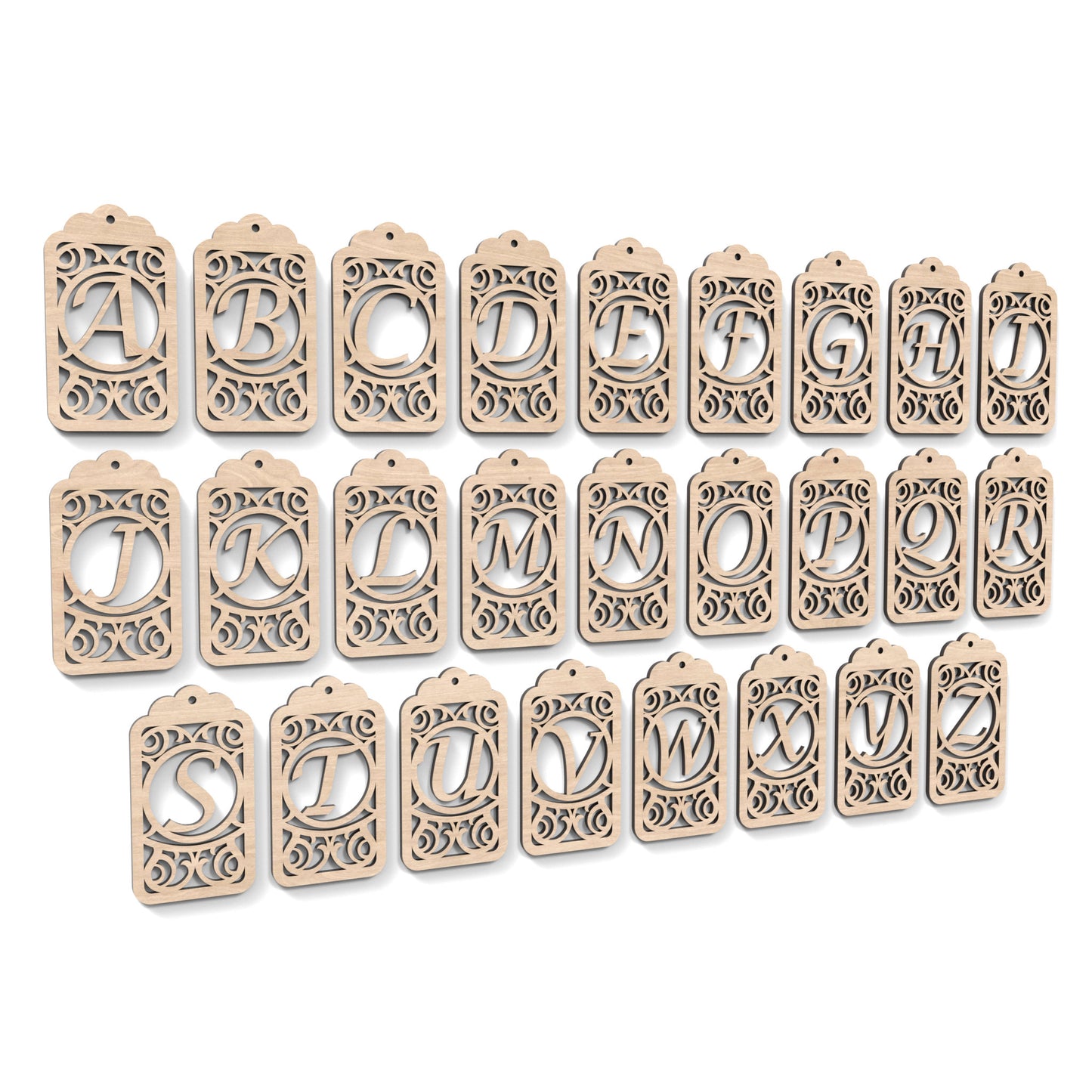 The full alphabet A-Z of Monogram Gift Tags made from our laser cutting files and available as a digital download. Each gift tag features a separate letter cut out of its centre.