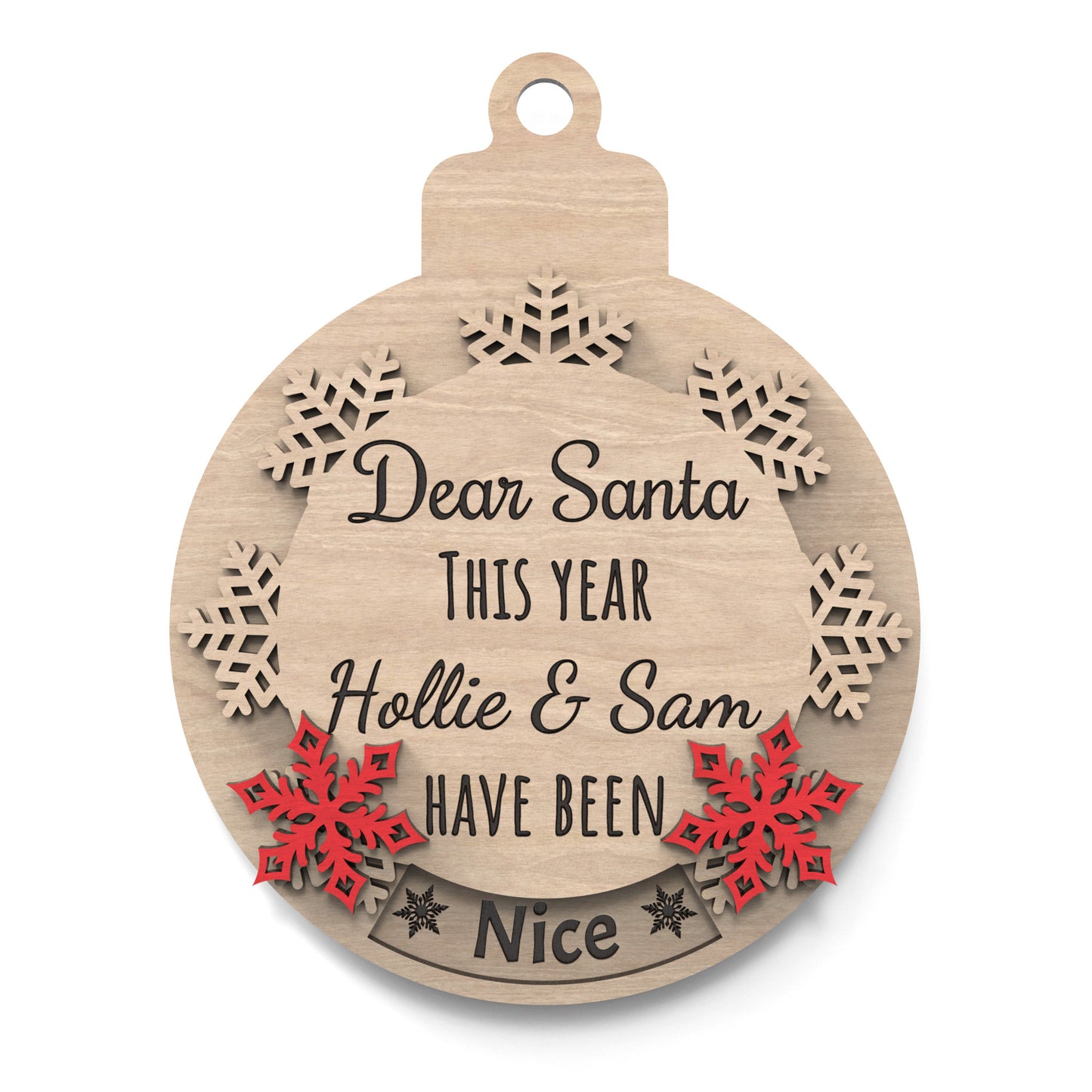 Naughty or Nice Christmas bauble made from our laser cutting files and available for digital download. Features a rotating snowflake that alternates between 'Nice' and 'Naughty' through a cut-out window. Includes the phrase 'Dear Santa, This Year,' space for a personalized name, and 'Have Been' followed by 'Naughty' or 'Nice'.