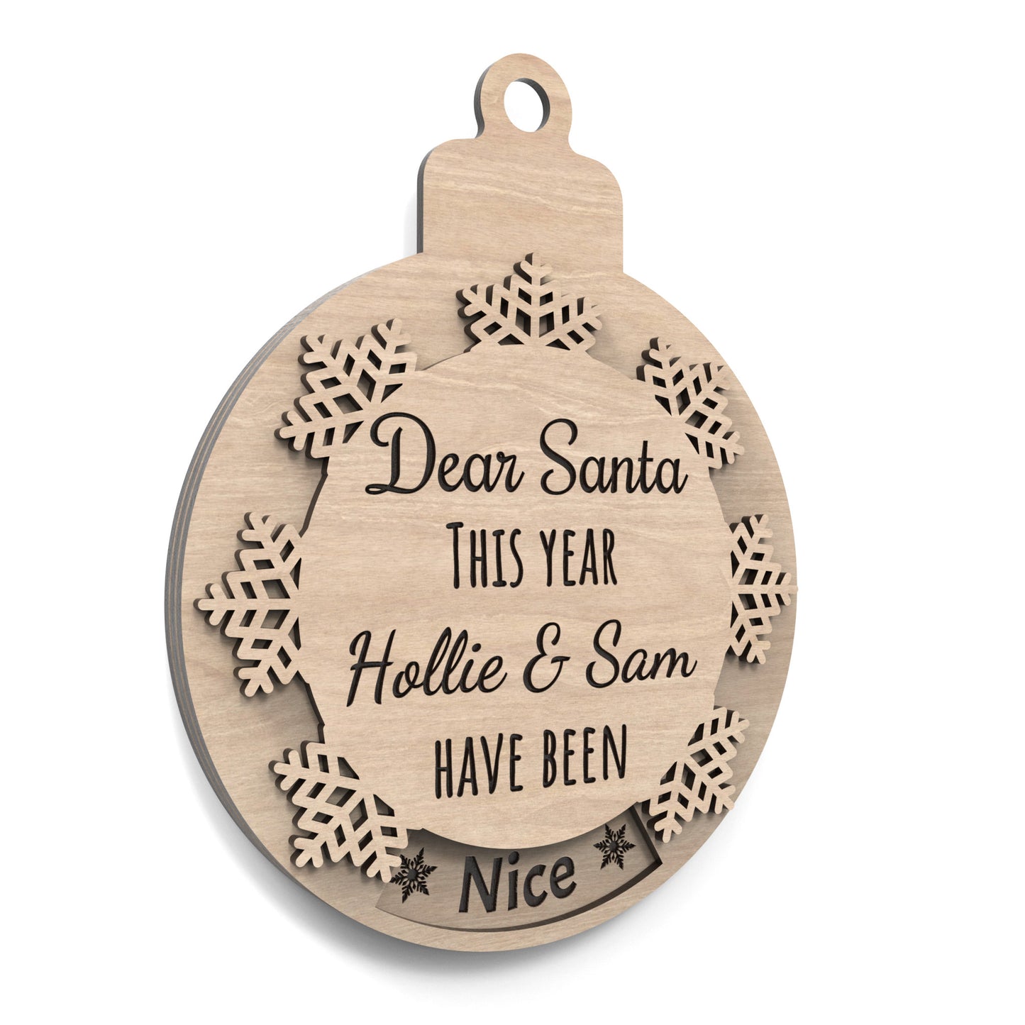 Naughty or Nice Christmas bauble made from our laser cutting files and available for digital download. Features a rotating snowflake that alternates between 'Nice' and 'Naughty' through a cut-out window. Includes the phrase 'Dear Santa, This Year,' space for a personalized name, and 'Have Been' followed by 'Naughty' or 'Nice'.