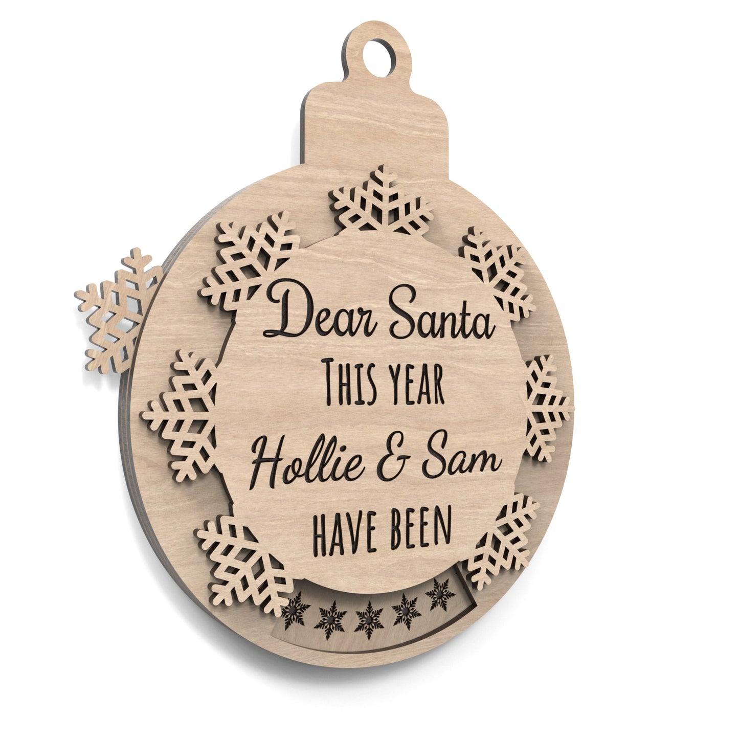 Naughty or Nice Christmas bauble made from our laser cutting files and available for digital download. Features a rotating snowflake that alternates between 'Nice' and 'Naughty' through a cut-out window. Includes the phrase 'Dear Santa, This Year,' space for a personalized name, and 'Have Been' followed by 'Naughty' or 'Nice'.