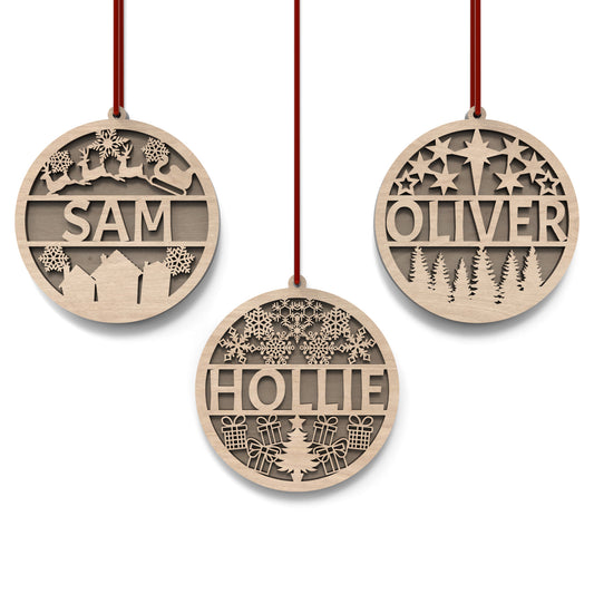 Set of 3 personalized Christmas bauble ornaments made from our laser cutting files and available for digital download. Includes 3 detailed front baubles with a hollow middle section for names to be cut out and a solid back bauble to create a dual layered bauble.