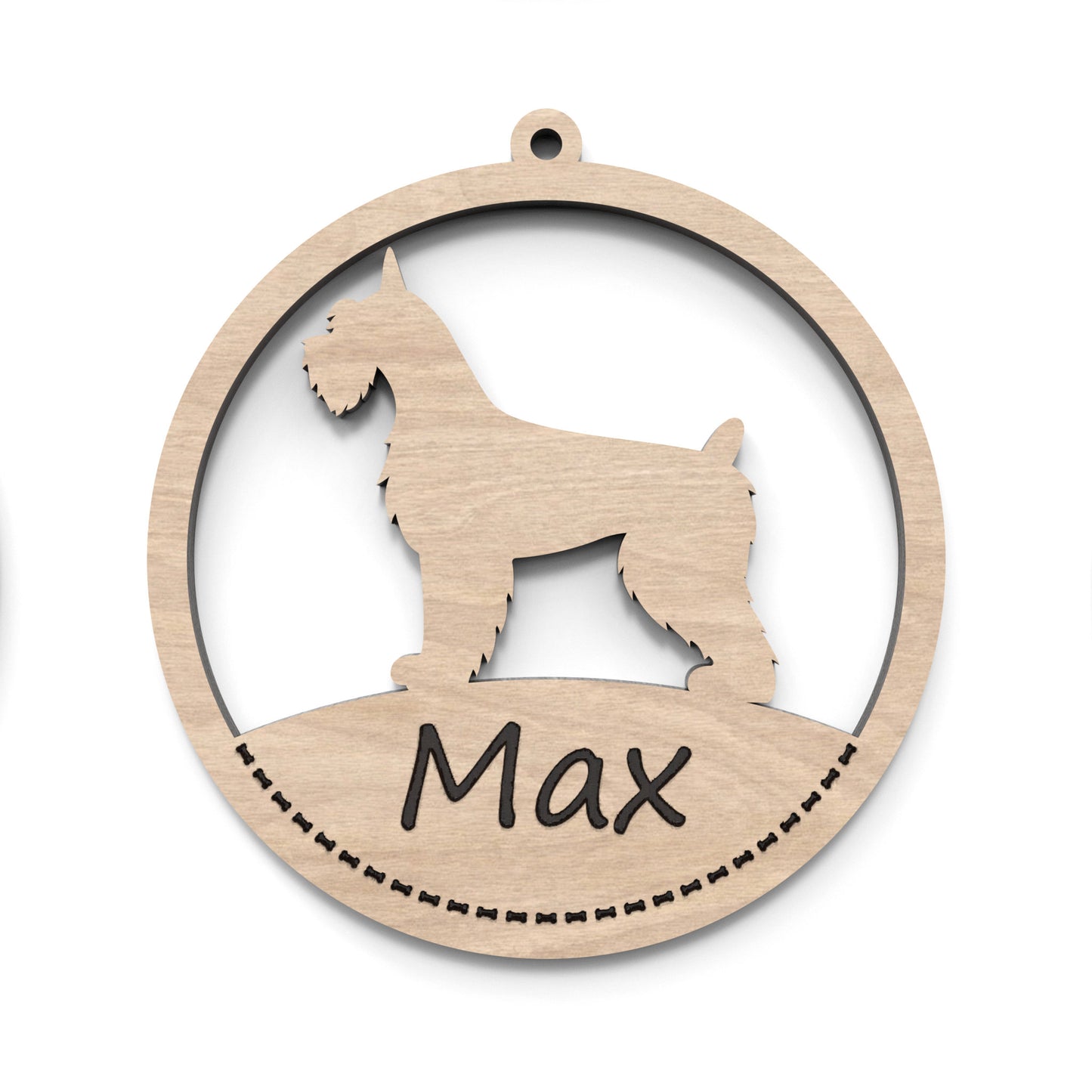 A dog bauble ornament made from our laser cutting files and available for digital download. The ornament features a circular bauble shape with a silhouette of your favourite dog breed in the centre and a space at the bottom for personalization.