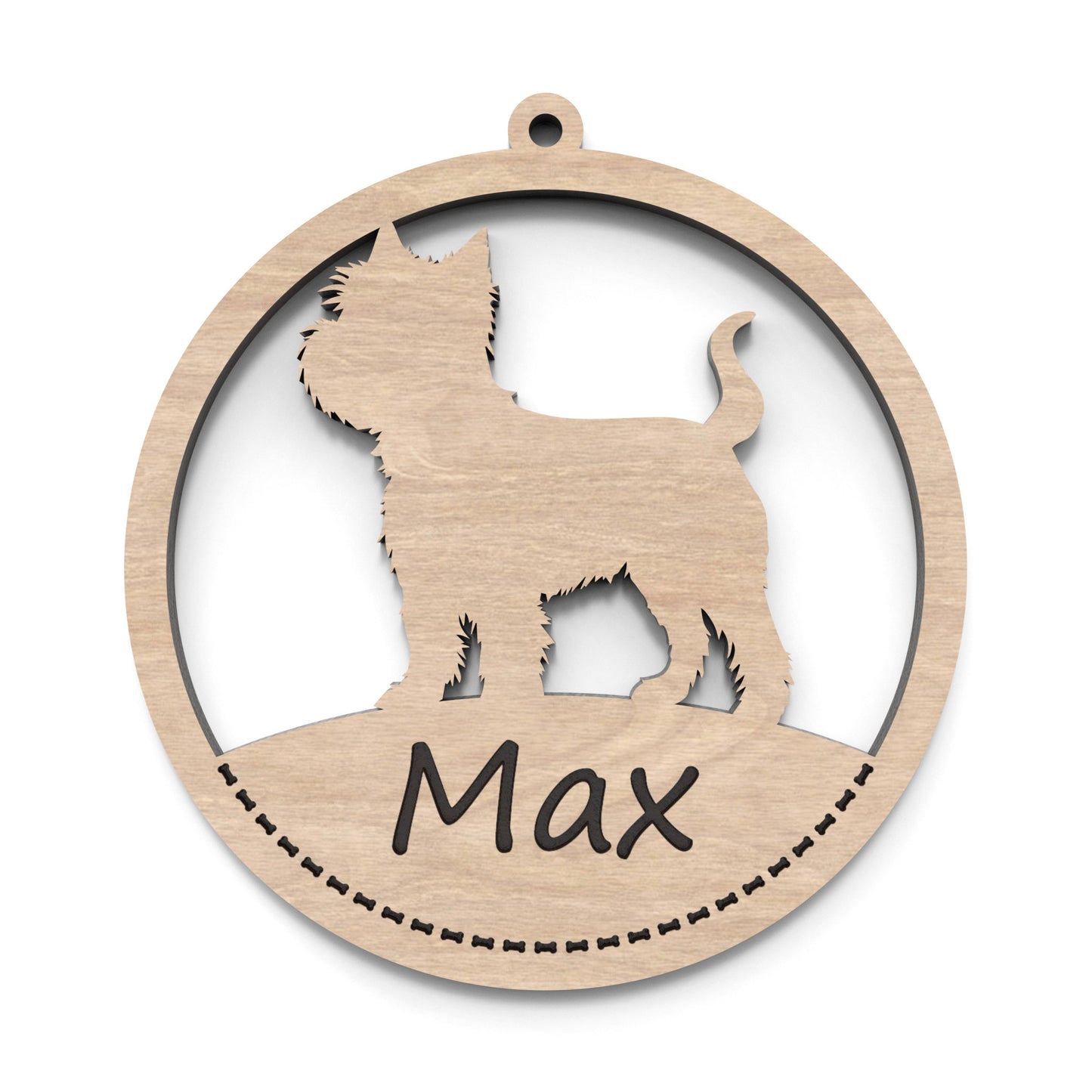 A dog ornament bauble made from our laser cutting files and available for digital download. Each ornament features a circular bauble shape with a silhouette of your favourite dog breed in the centre and a space at the bottom for personalization.