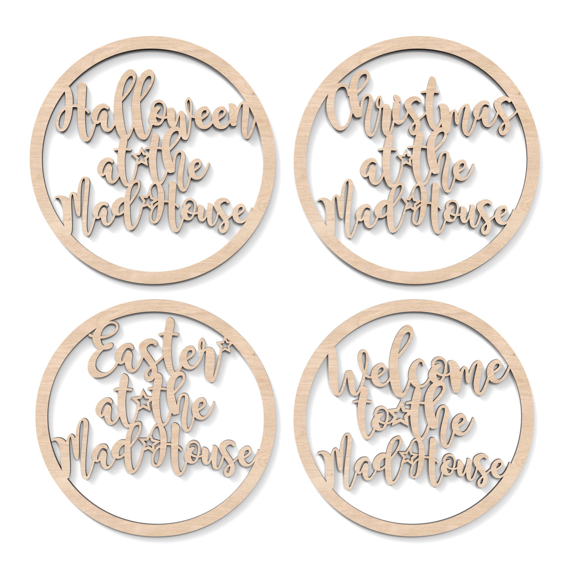 Welcome, Easter, Halloween and Christmas at the Madhouse Hoop Signs Wall Art made from our laser cutting files and available as a digital download. Each hoop features wording cut out of its centre with either "Welcome," "Easter," "Halloween," or "Christmas" followed by "at the Madhouse.