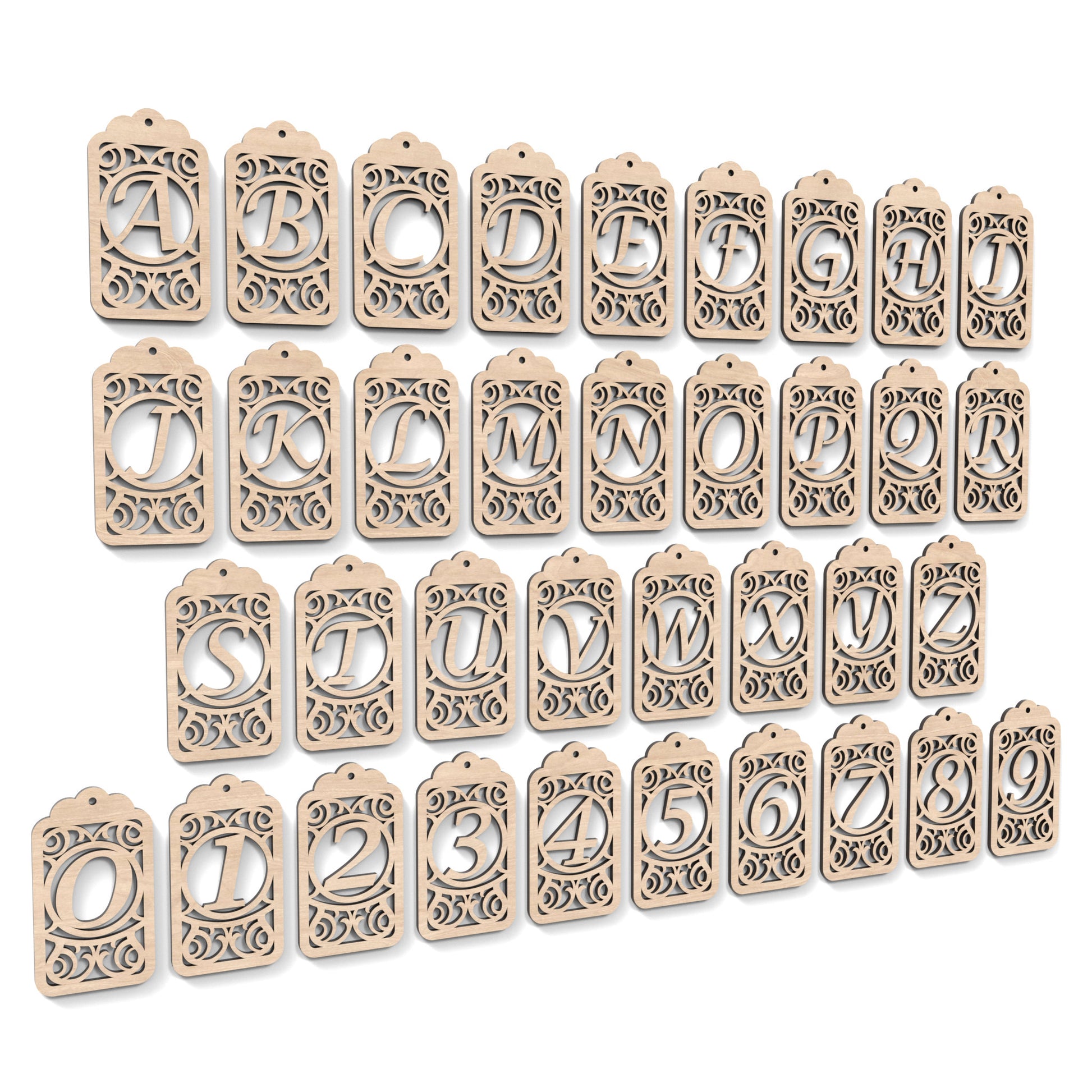 The full alphabet A-Z of Monogram Gift Tags made from our laser cutting files and available as a digital download. Each gift tag features a separate letter or number cut out of its centre.