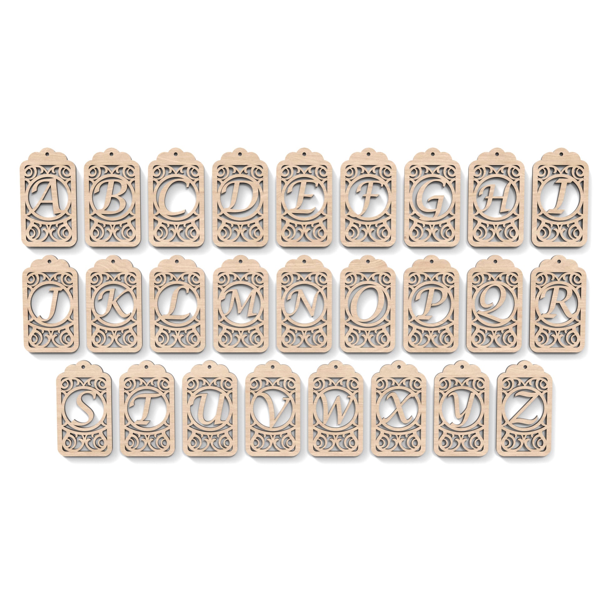 The full alphabet A-Z of Monogram Gift Tags made from our laser cutting files and available as a digital download. Each gift tag features a separate letter cut out of its centre.