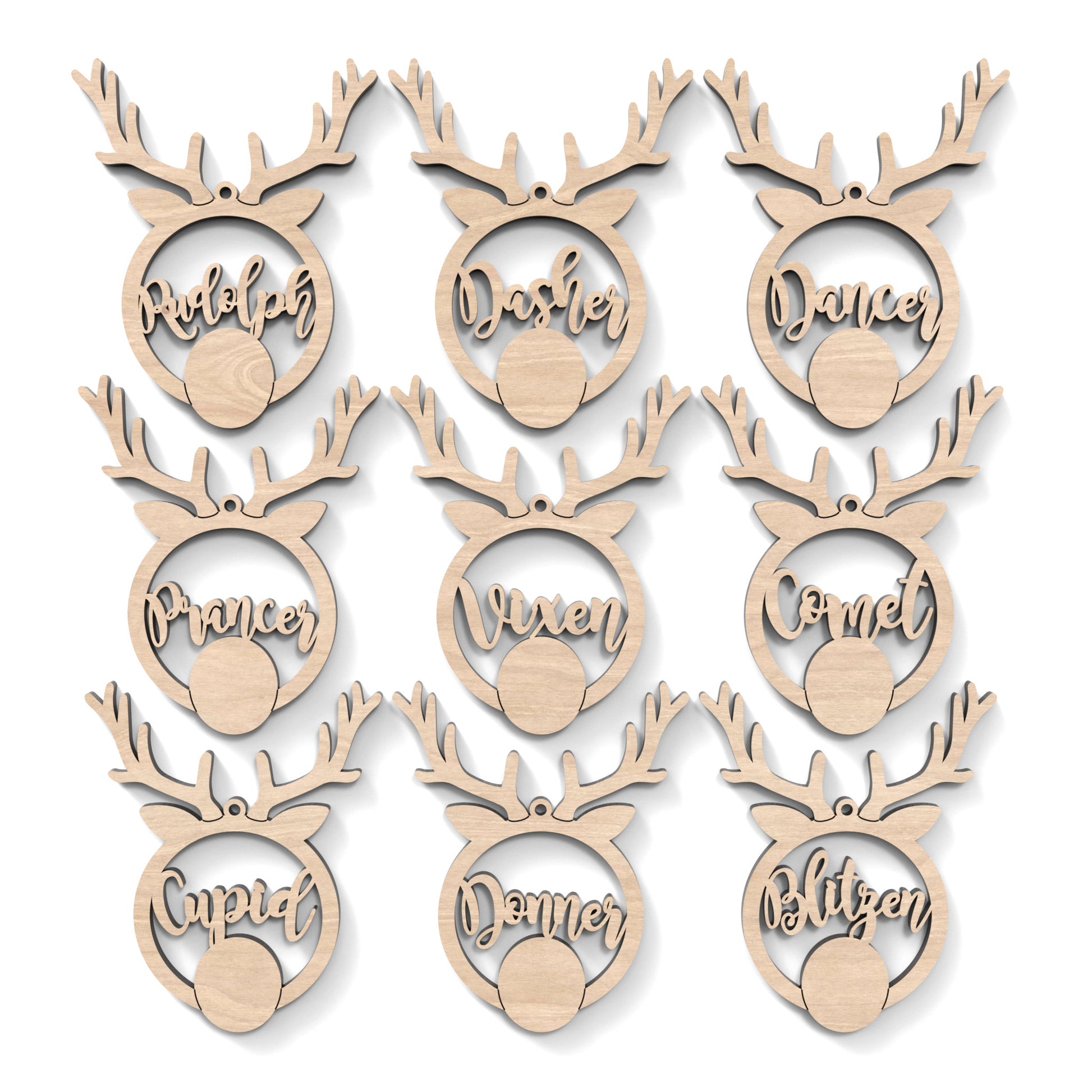 Set of 9 Santa's Reindeer Baubles made from our laser cutting files and available for digital download. Each reindeer has a name of Santa's reindeer cut out of its centre.