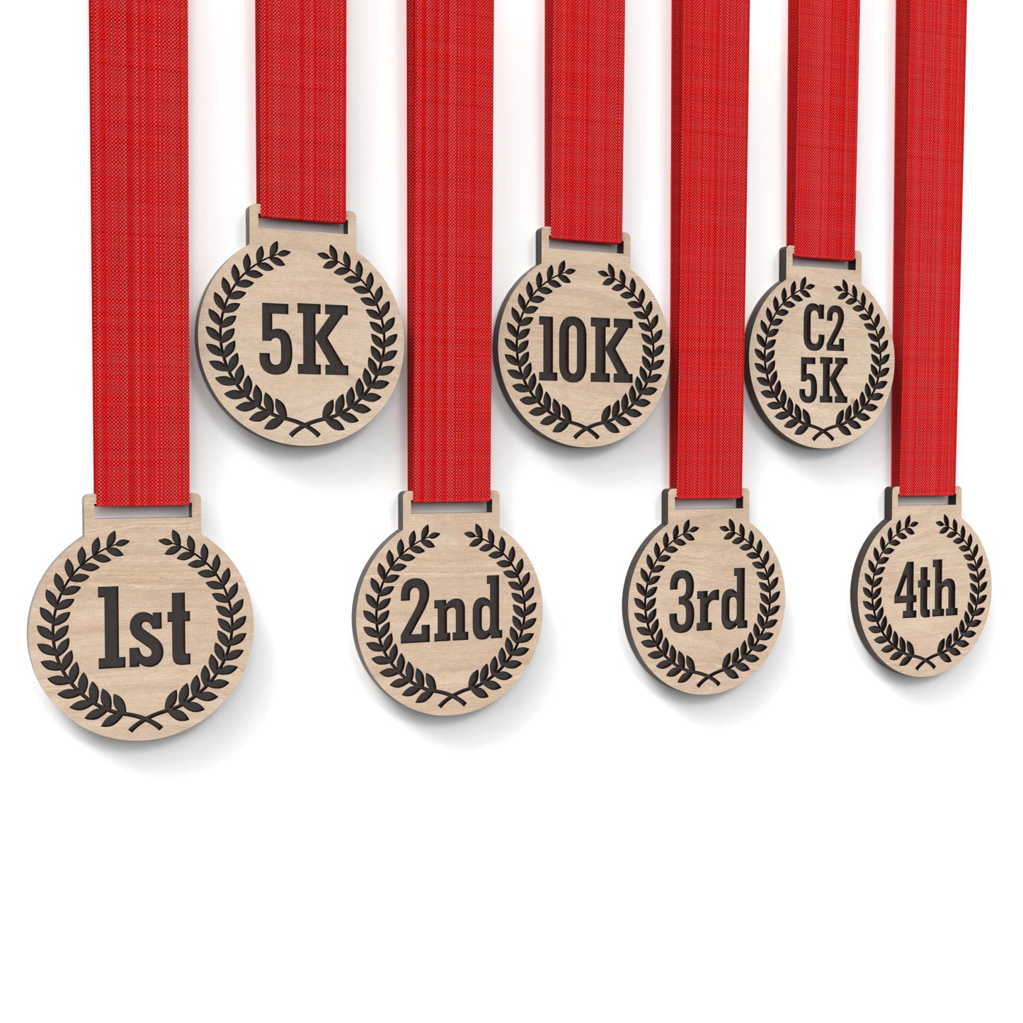 Set of 8 running medals made from our laser cutting files and available for digital download. Each medal is 6cm wide with a slot for a 2.5cm ribbon at the top and features engraving for 5K, 10K, C25K, and 1st to 5th place.