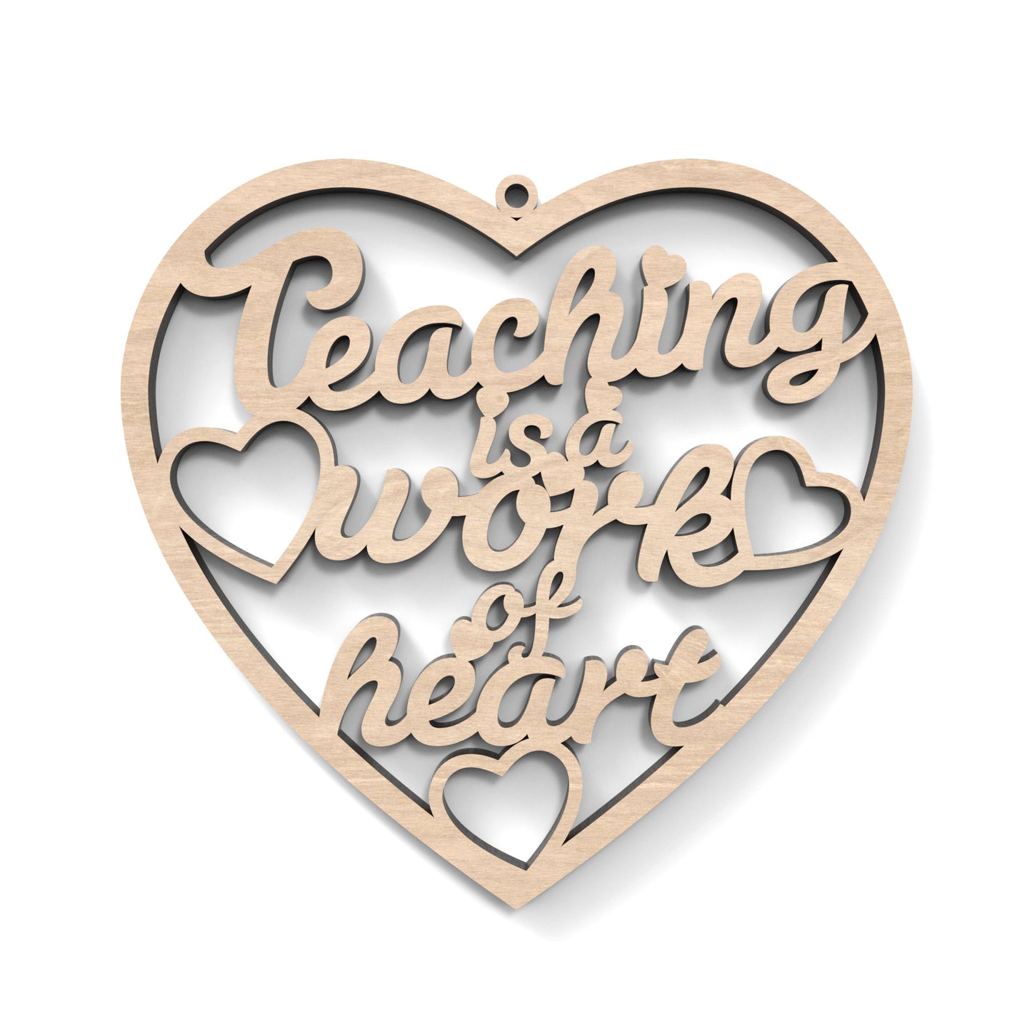 A Teacher Appreciation Heart with "teaching is a work of heart" cut out of the centre, made from our laser cutting files and available for digital download.